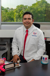 Dr. Manuel Alfonso Baños González Refrenda Reconocimiento Como Investigador Nacional Nivel I El Dr. Manuel Alfonso Baños González, Investigador Nacional Nivel I, Sonríe A La Cámara En Su Consultorio De Villahermosa, Tabasco, Reafirmando Su Compromiso Con La Excelencia Cardiovascular.